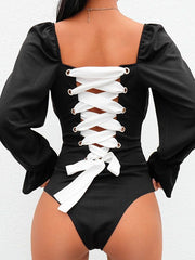 Load image into Gallery viewer, Long Sleeve Laced-up Back One-piece Bodysuit.