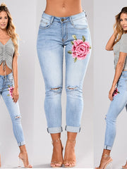 Load image into Gallery viewer, Flower Embroidered Ripped Jeans