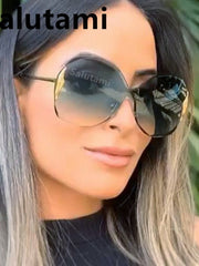 Load image into Gallery viewer, Rimless One Piece Metal Frame Women's Sunglasses