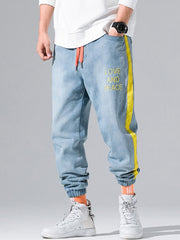 Load image into Gallery viewer, Love and Piece Print Jeans
