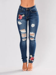 Load image into Gallery viewer, Flower Embroidered Ripped Jeans
