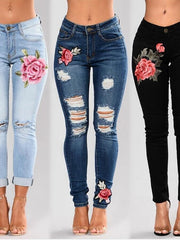 Load image into Gallery viewer, Flower Embroidered Ripped Jeans
