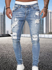 Load image into Gallery viewer, Ripped Skinny Jeans
