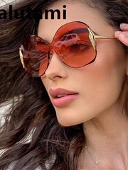 Load image into Gallery viewer, Rimless One Piece Metal Frame Women&#39;s Sunglasses
