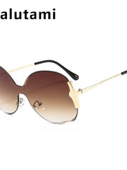 Load image into Gallery viewer, Rimless One Piece Metal Frame Women&#39;s Sunglasses
