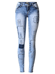 Load image into Gallery viewer, Ripped Skinny Jeans
