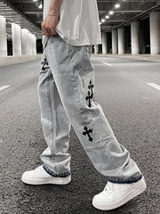 Load image into Gallery viewer, Distressed Denim Jeans
