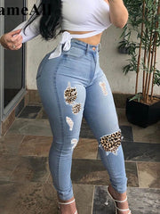 Load image into Gallery viewer, Leopard Patchwork Ripped Jeans
